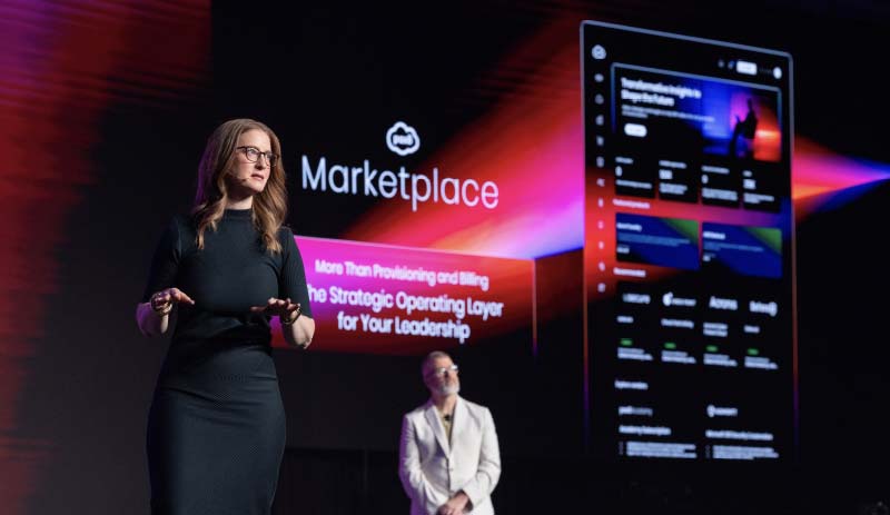 Liby Mcilhanny presenting on stage at Pax8 Beyond 2026 Salt Lake City