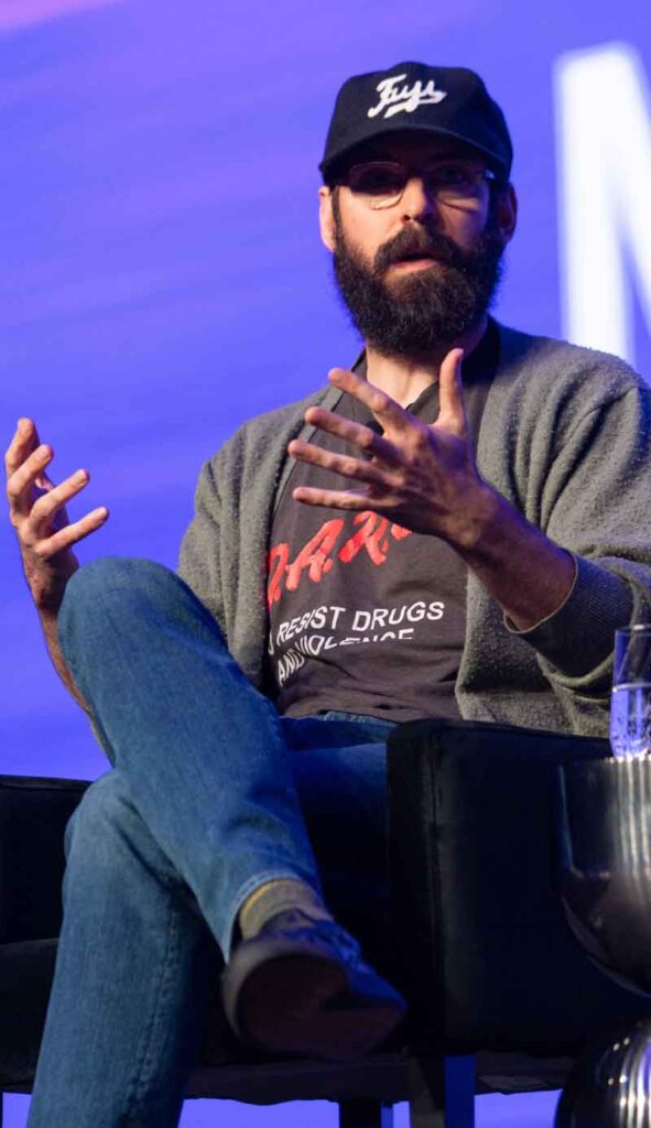 Martin Starr presenting on stage at Pax8 Beyond 2026 Salt Lake City